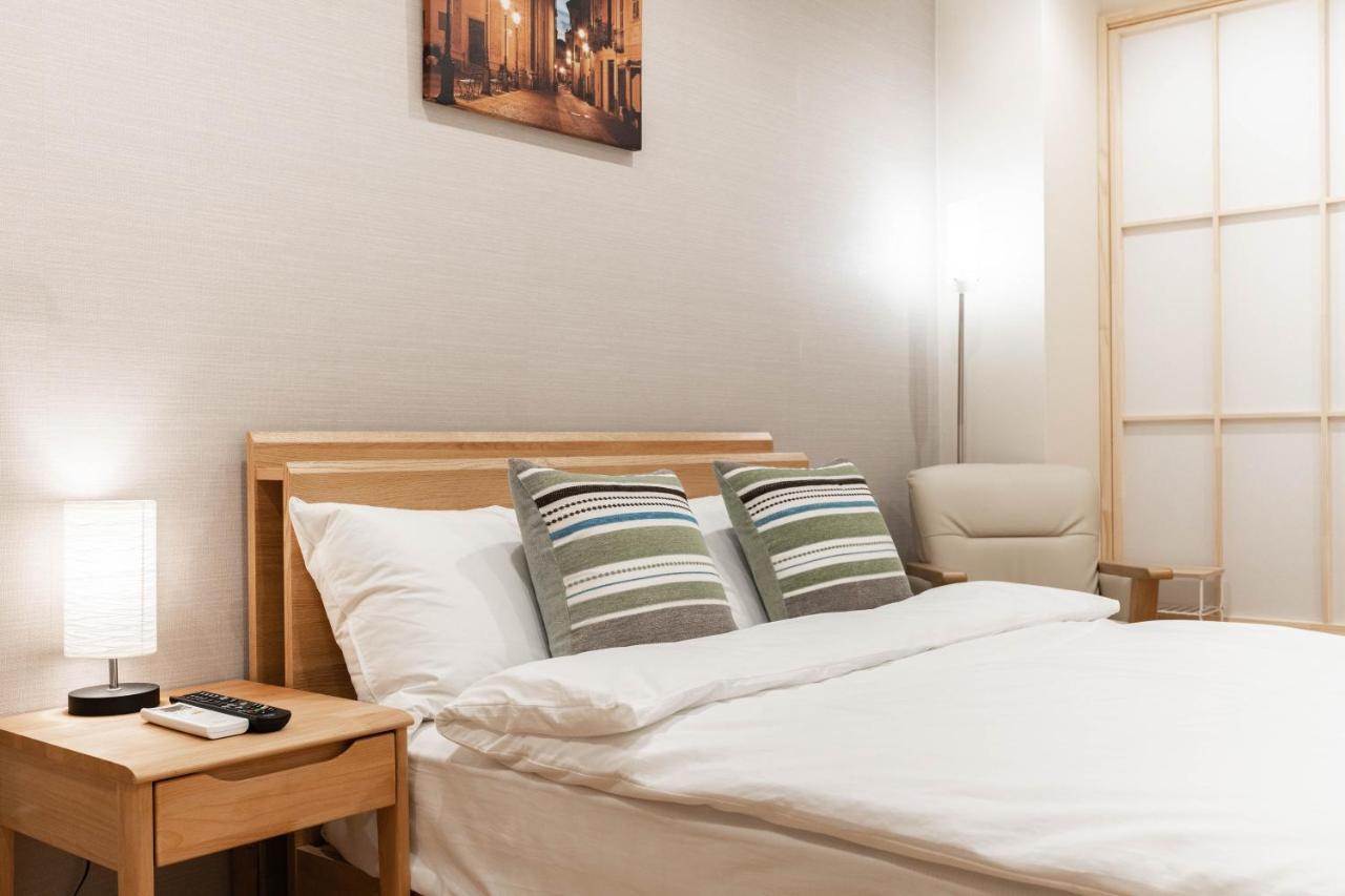 大阪道顿堀 铁甲猫の家 Apartment Bagian luar foto