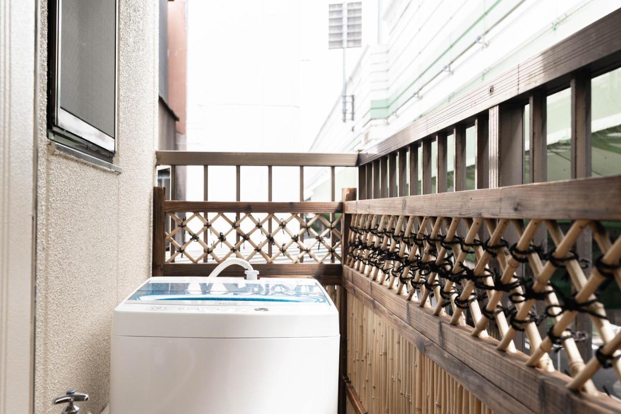 大阪道顿堀 铁甲猫の家 Apartment Bagian luar foto